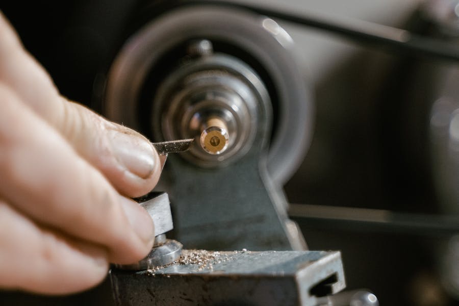 Precision key cutting on a professional locksmith machine
